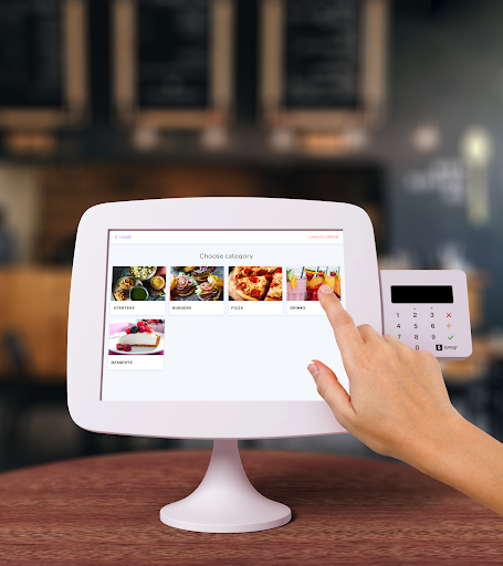 Self-service kiosks for contactless and table ordering in a bar