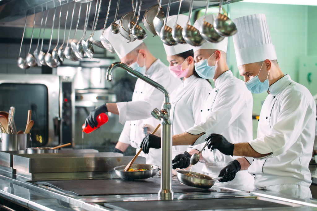 chefs working in masks tips for restaurants to survive during covid